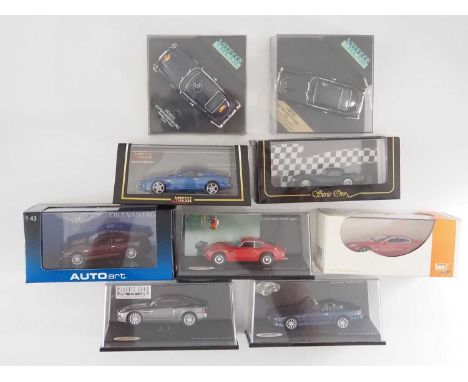 A group of  1:43 scale models by AUTO ART, VITESSE, IXO and TOP MODEL comprising of Aston Martin automobiles,  to include an 