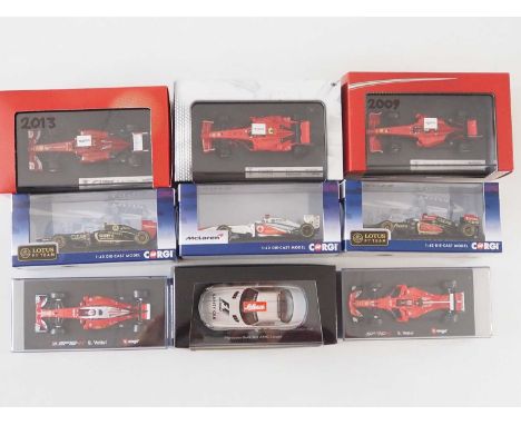 A group of 1:43 scale Formula 1 race cars by HOTWHEELS, CORGI and BBURAGO plus SCHUCO F1 safety car comprising of assorted F1