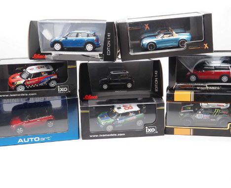 A group of 1:43 scale models by IXO, SCHUCO, NOREV, MINICHAMPS and AUTO ART comprising of Mini automobiles,  to include a SCH