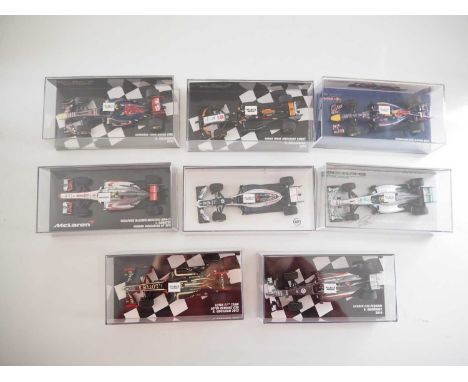 A group of 1:43 scale Formula 1 race cars by MINICHAMPS, comprising of F1 cars from 2012, 2013 and 2014 seasons, to include a