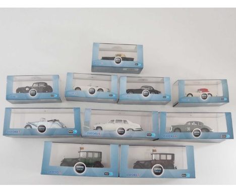 A group of 1:43 scale models by OXFORD DIECAST, comprising of Daimler and Jaguar automobiles, to include a 1929 Daimler (King