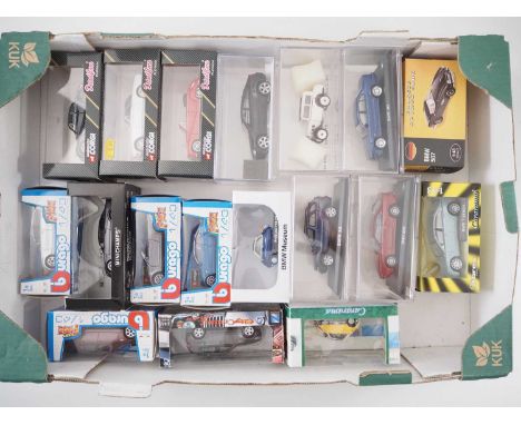 A group of boxed and unboxed 1:43 scale models to include BBURAGO and MINICHAMPS, comprising of BMW Automobile manufacturers-