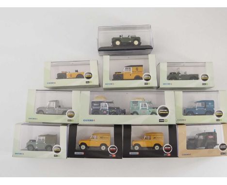 A group of 1:43 scale models by OXFORD DIECAST, comprising of Land Rovers, to include a First Overland set, a 1948 Land Rover