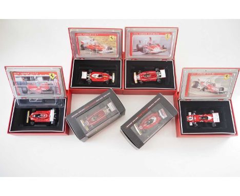 A group of 1:43 scale Formula 1 race cars by HOTWHEELS, comprising of 1970s Ferrari Formula 1 racing cars, to include a 1974 