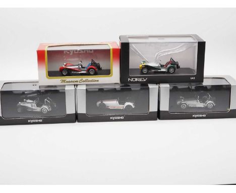 A group of 1:43 scale models by KYOSHO and NOREV, comprising of Caterham automobiles to include a NOREV 1979 Caterham Super S