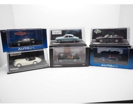 A group of 1:43 scale models by NOREV, AUTO ART and VITTESE , comprising of Jaguar automobiles, to include a NOREV 1957 Jagua