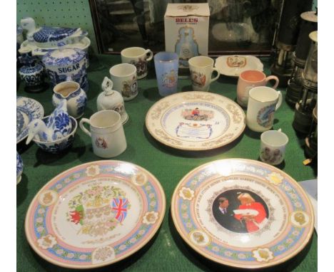 A large quantity of commemorative china, to include: three wall plates, mugs, bowls and a Bell's Scotch whisky.