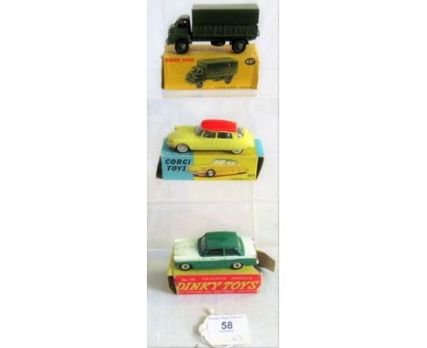 A Corgi Toys die-cast model of a Citroen DS19, together with a Dinky Toys 3 ton Army wagon and a Triumph Herald (all boxed).