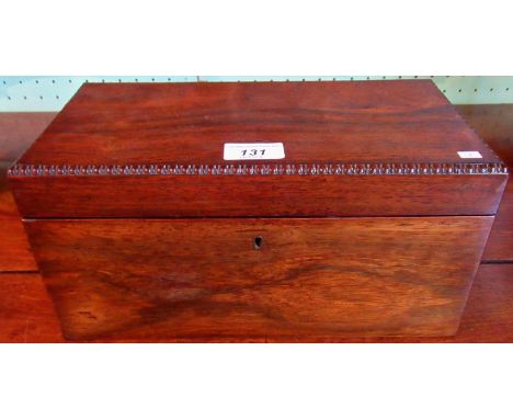 A 19th century rosewood tea caddy with twin compartments and associated brass mixing bowl.