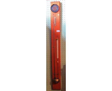 An enthusiasts made column of a mercury stick thermometer on mahogany plinth.