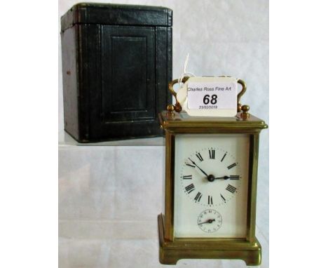 A 20th century four plate glass carriage clock in original case. Condition Report: Key present, non-functional alarm.  Shell 