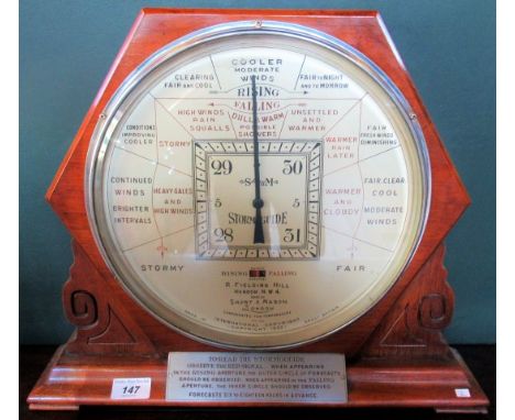 A 20th century oak framed Stormoguide, bearing the name R. Fielding Hill, Hendon NW4, made by Short &amp; Mason London,. Cond
