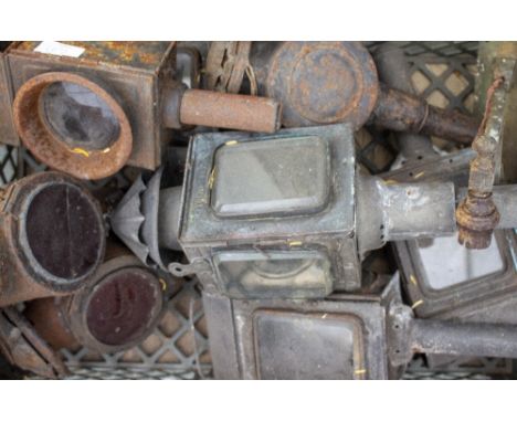 A COLLECTION OF VARIOUS OLD BLACK PAINTED TIN CANDLE LANTERNS, and a tilley lamp