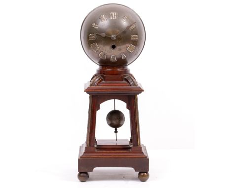 AN EARLY 20TH CENTURY GERMAN MADE JUNGHANS NOVELTY GLOBE MANTLE CLOCK the brass globe dial with roman numerals on a mahogany 