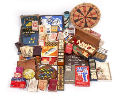 A QUANTITY OF PLAYING CARDS, cribbage boards, chess set, marbles, table top games, a parquetry cribbage board, dominoes, cour