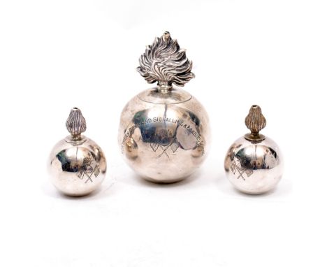 A SILVER CIGAR LIGHTER in the form of a grenade, inscribed with Northern Command Signalling and Bombing School, November 1916