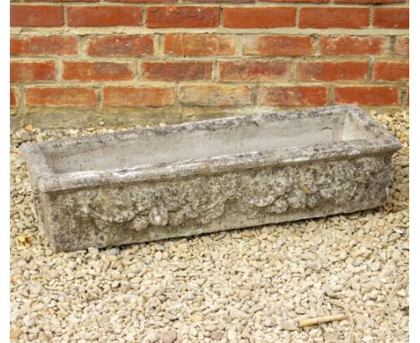 A COMPOSITE RECTANGULAR PLANTER decorated with fruits 91cm wide x 31cm deep x 20cm high
