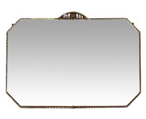 AN OCTAGONAL WALL MIRROR with a metal frame and bevelled edge, 75cm x 49cm