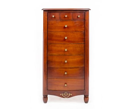 A LATE 20TH / EARLY 21ST CENTURY HARDWOOD BOW FRONTED TALL NARROW CHEST OF NINE DRAWERS with painted turned knob handles and 