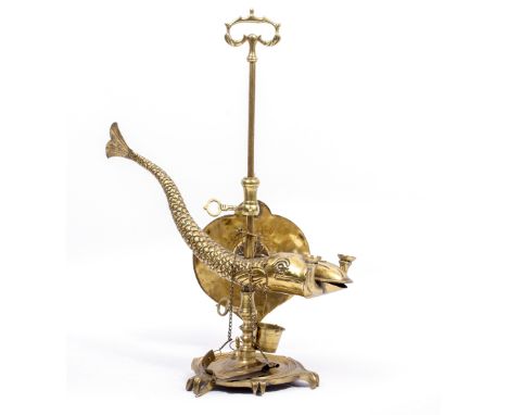 AN EASTERN ADJUSTABLE BRASS OIL LAMP of serpent form, 37cm wide x 44cm high