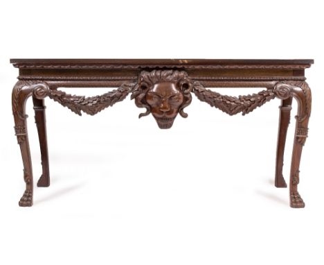 A HARDWOOD CONSOLE TABLE with a rectangular top, a lions mask and swag undertier, cabriole legs and paw feet, 152.5cm wide x 