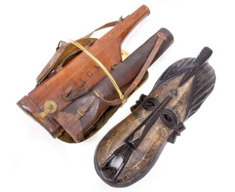 TWO OLD LEATHER GUN CASES together with an African decorative mask, topper log holder and a set of health-o-meter bathroom sc