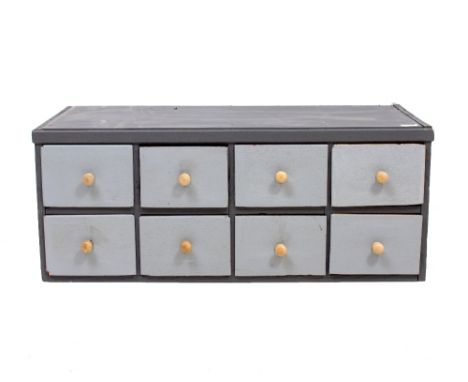 A GREY AND LIGHT BLUE CHEST OF EIGHT SMALL DRAWERS 87cm wide x 40cm deep x 35cm high