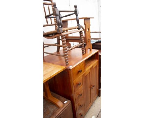 A CAMPHOR WOOD CHEST together with oak stool and bobbin turned chair, side cabinet with drawers and a cupboard, and a leather