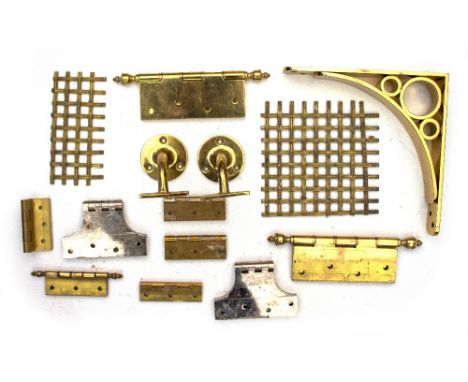 A COLLECTION OF BRASS HINGES brackets and other door fittings together with a collection of bookcase shelf adjustment fitting