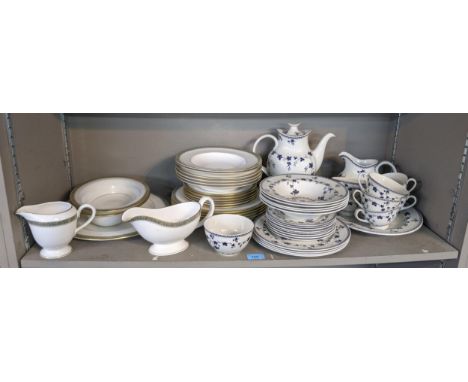 A Royal Worcester dinner service 'St Andrews' pattern and a Royal Doulton part dinner service ' York Town'Location:If there i