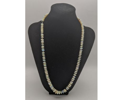 A possibly Ethiopian opal beaded necklace on a 14ct gold clasp.Location: 