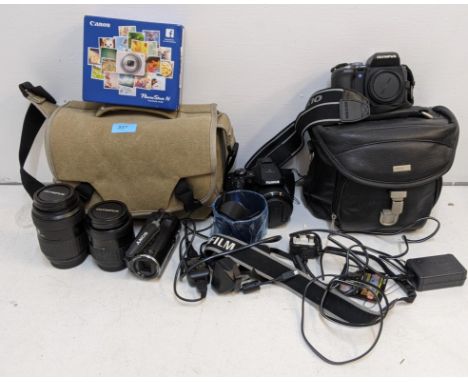 Digital photography equipment and accessories to include an Olympus E-500, a Fujifilm Finepix S1, two Olympus lenses, a 40-15