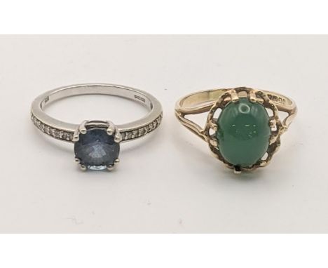 A 9ct gold ring set with a jade cabouchon and a white 9ct gold ring, 4.9gLocation:If there is no condition report shown, plea