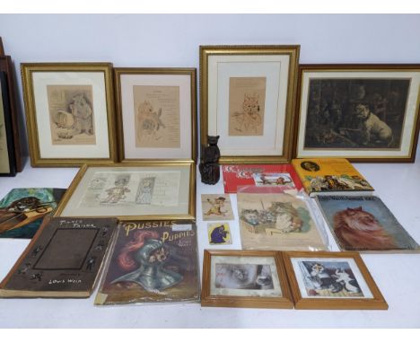 A collection of Louis Wain cat illustrated pictures and ephemera to include early 20th century framed and glazed prints, book