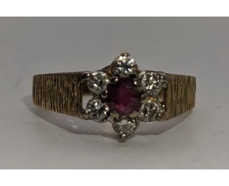 An 18ct gold ruby and diamond cluster ring 3.5gLocation:If there is no condition report shown, please request 