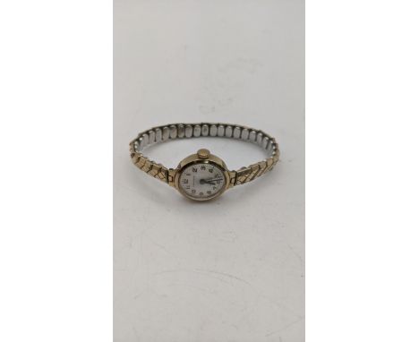 A 9ct gold ladies Excalibur manual wind wristwatch on an expanding strapLocation:If there is no condition report shown, pleas