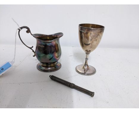 A group of silver items to include an Elizabeth II cream jug Sheffield 1977, 708.7g mark Oliver & Bower Ltd, a John Dixon & S