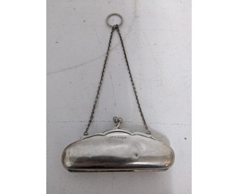 A George V silver ladies purse with leather fitted interior on a chain and suspension ring, Birmingham 1918, makers mark for 