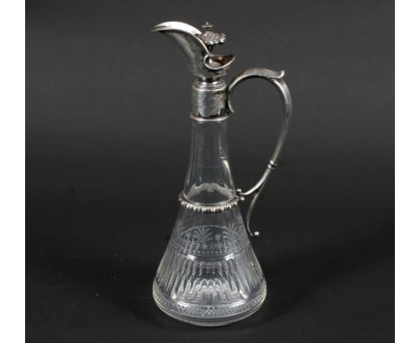 A German .800 standard silver mounted clear-glass tapering claret jug and hinged stopper. The tapering glass body engraved wi