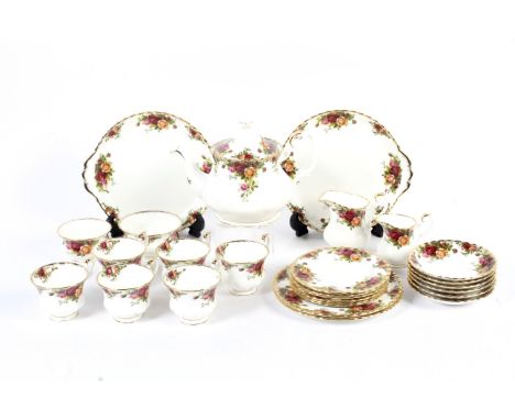 A Royal Albert 'Country Roses' pattern bone china tea service. Printed marks, comprising: a teapot and cover, a milk jug, a c