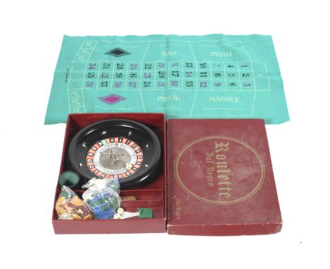Roulette- Dal Negro Treviso-Italia, a boxed ( bred Morroco colour) gambling set to include wheel, marked baize , worth coiunt