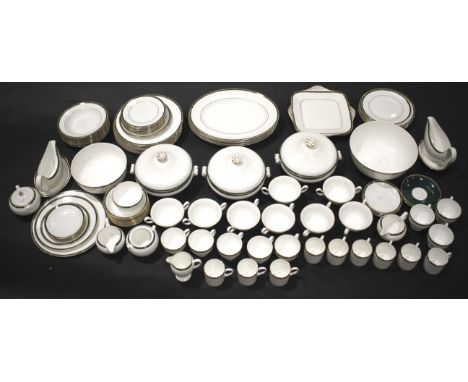 An extensive Wedgwood bone china dinner service in the 'Chorale' pattern. Including cups and saucers, plates, tureens, a sauc