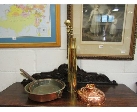 A brass shell case with two fire tools, two copper saucepans and bed warmer