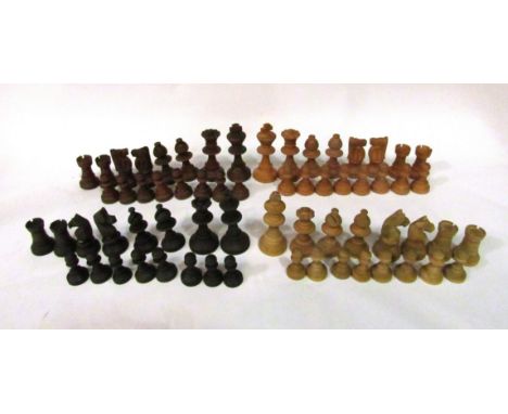 Two carved wooden chess sets