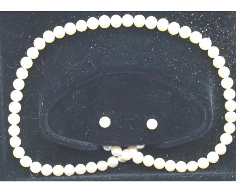 9ct gold pearl earring and necklace set in original box. P&amp;P Group 1 (£14+VAT for the first lot and £1+VAT for subsequent