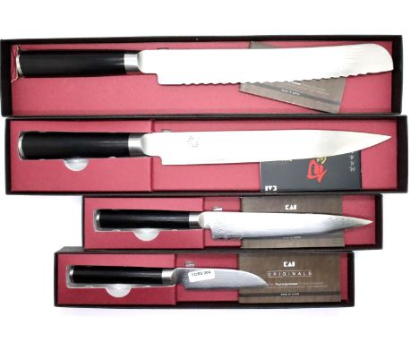 Four boxed Damascus bladed kitchen knives by Kai originals for Shun. P&amp;P Group 1 (£14+VAT for the first lot and £1+VAT fo