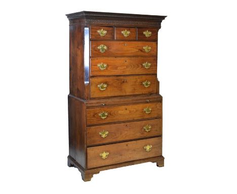 George III oak chest on chest or tallboy, the upper stage with guilloche cornice over blind fretwork frieze and three short d