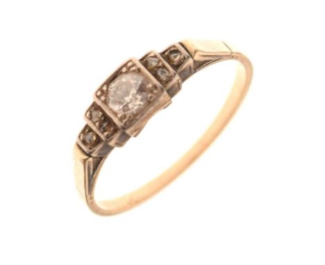 Yellow metal and diamond ring, set an old-brilliant cut diamond, with rose cut diamond set shoulders, the shank stamped '585'