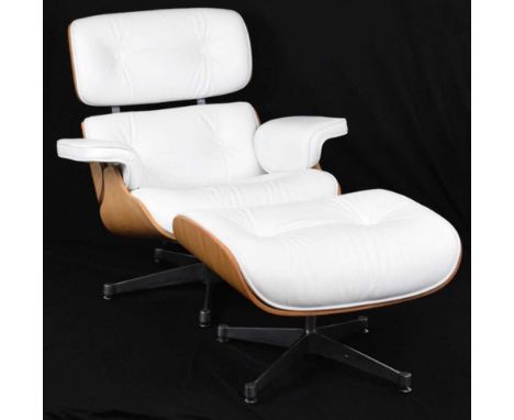 Modern Eames style armchair and stool in white hide. Chair - 63cm (seats widest point) x 81cm high, stool - 64cm x 52cm x 42c