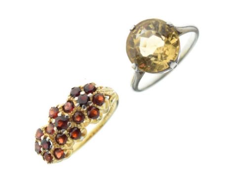 9ct gold cluster ring set garnets, size L, 3.7g gross approx, and an unmarked white metal ring set a round faceted citrine, 1